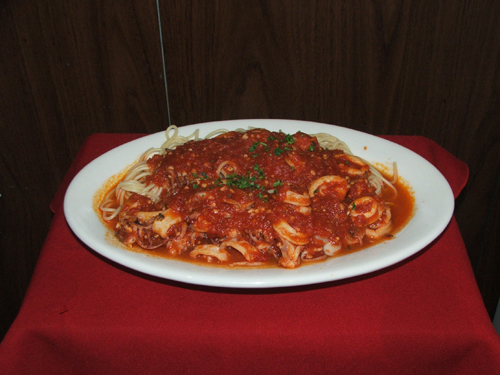 Calamari Marinara. Calamari sauteed in Marinara sauce.