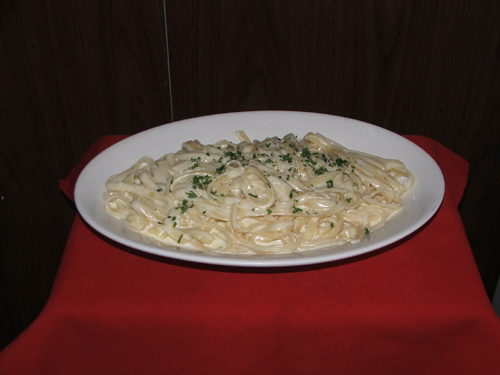Fetuccini Alfredo pasta with cream sauce.