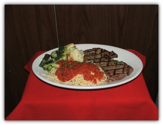 Trancia Di Carne A La Griglia. Ribeye steak grilled.