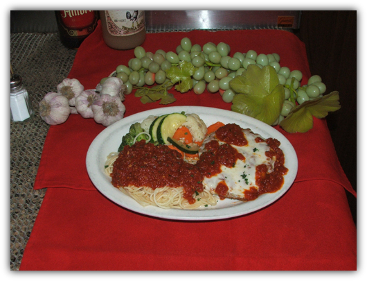 Eggplant Parmigiana with pasta and vegetables.
