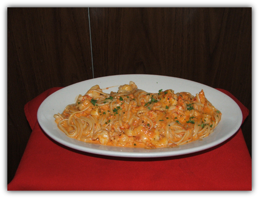 Linguini Cape Sante with scallops, cream and brandy.