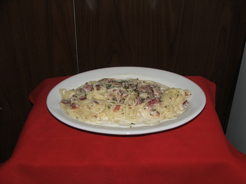 Spaghettini Carbonara with bacon and cream sauce.