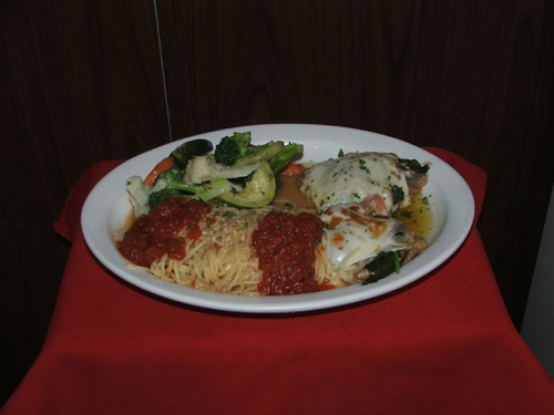 Vitello Saltimbocca.Vealwith Italian ham, spinach and special sauce.